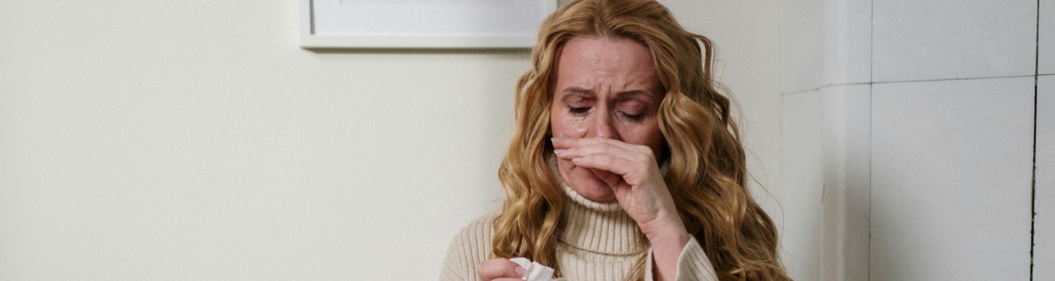 a woman having an allergy